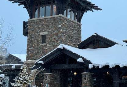 tall tower and entrance to skii lodge.